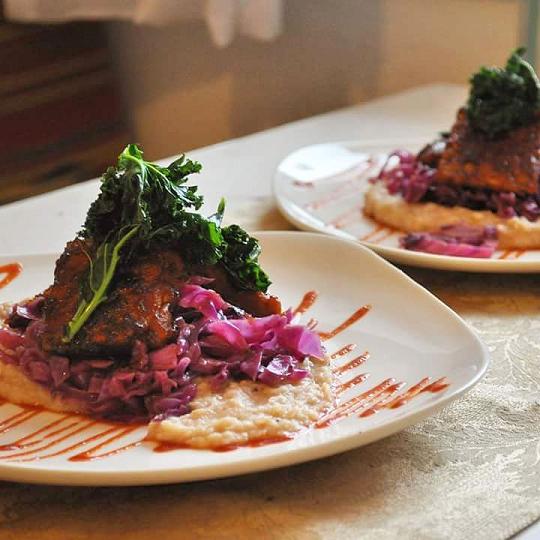 Maple-Sriracha Seared Tempeh over Cannelini Bean Puree with Braised Red Cabbage and Crispy Kale